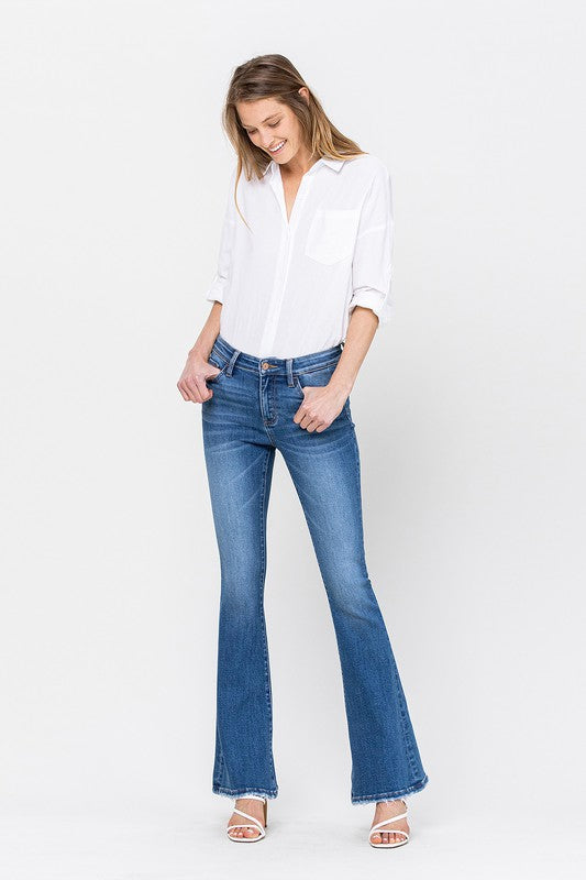 TIMELESS EMBODY MID RISE FLARE JEANS